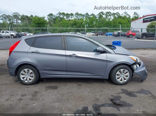 KMHCT5AE1HU345727 2017 HYUNDAI ACCENT Gray Widok wnętrza z tyłu