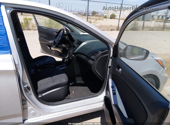 KMHCT5AE4GU283528 2016 HYUNDAI ACCENT Silver Front interior view