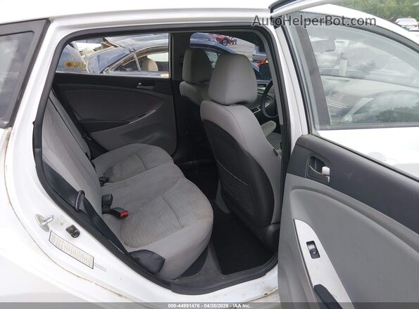 KMHCT5AE9HU334376 2017 HYUNDAI ACCENT White Вид наклейки з VIN-кодом
