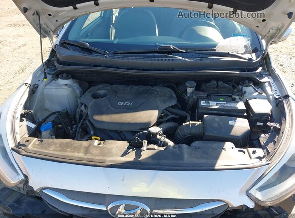 KMHCU4AE0GU139725 2016 HYUNDAI ACCENT Серебряный Вид сзади