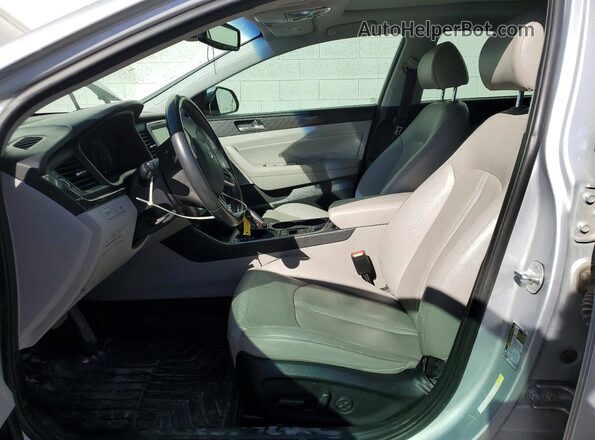 KMHE34L34KA092166 2019 HYUNDAI SONATA Серебряный Вид салона спереди