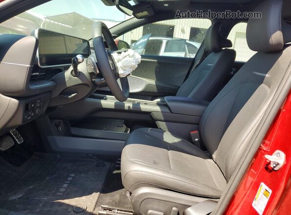 KMHM54AA9PA028302 2023 HYUNDAI IONIQ Красный Вид салона спереди