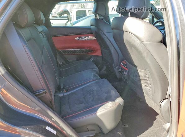KMUMCDTC6NU077507 2022 GENESIS GV70 Gray Vista interior trasera