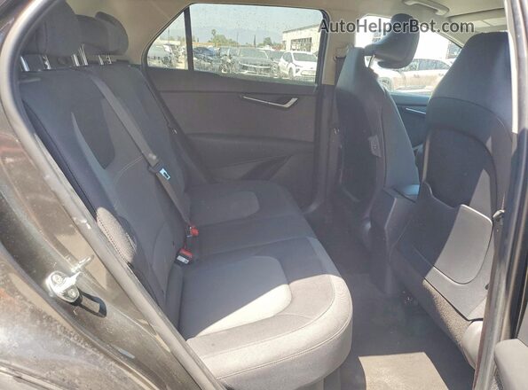 KNDCP3LE7T5318867 2026 KIA NIRO Gray Widok wnętrza z tyłu