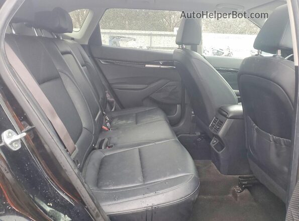 KNDERCAAXM7181867 2021 KIA SELTOS Black Vista interior trasera