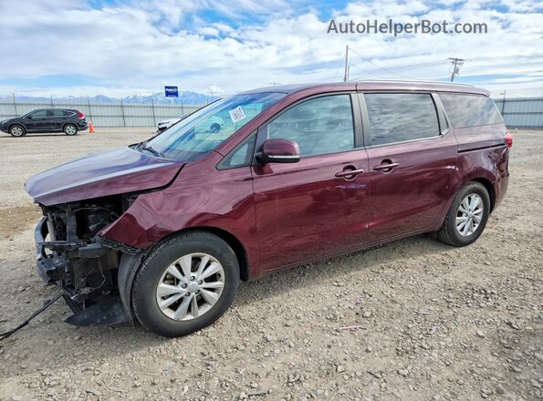 KNDMB5C11G6200163 2016 KIA SEDONA Burgundy Vista tres cuartos delantera izquierda