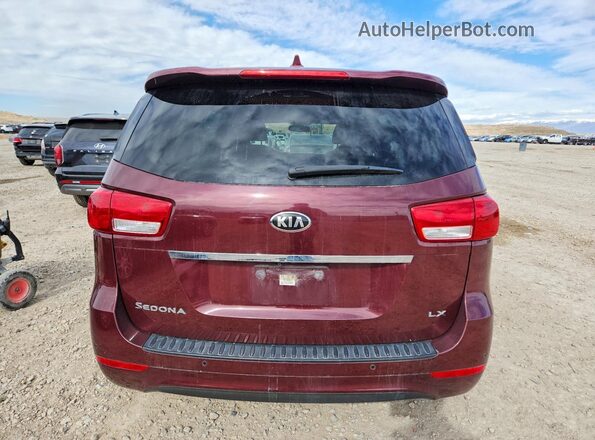 KNDMB5C11G6200163 2016 KIA SEDONA Burgundy Vista trasera