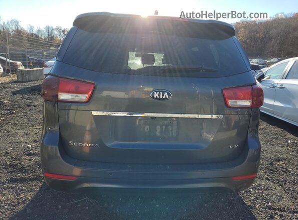 KNDMB5C11G6215875 2016 KIA SEDONA Gray Вид ззаду
