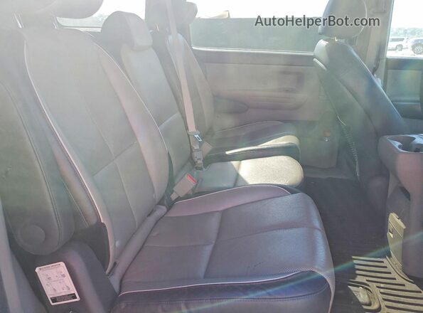 KNDMB5C12G6210569 2016 KIA SEDONA Gray Rear interior view