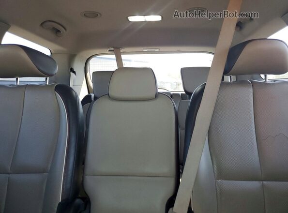 KNDMB5C12G6210569 2016 KIA SEDONA Gray Rear seats view