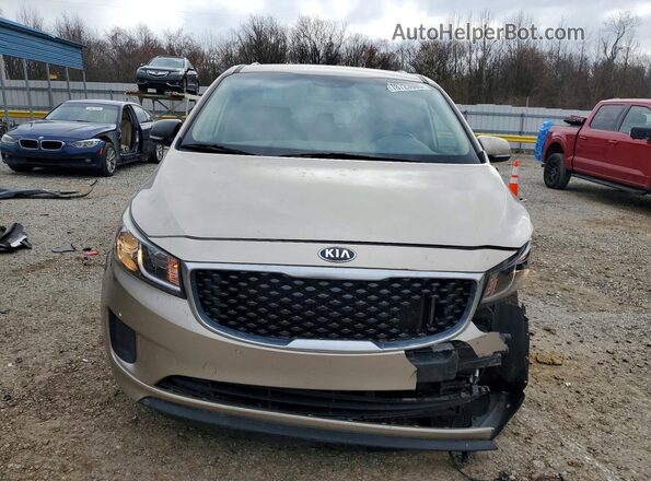 KNDMB5C12H6284737 2017 KIA SEDONA Золотой Вид спереди