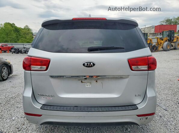 KNDMB5C13G6099711 2016 KIA SEDONA Silver Vista trasera