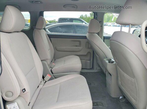 KNDMB5C13G6099711 2016 KIA SEDONA Silver Vista interior trasera