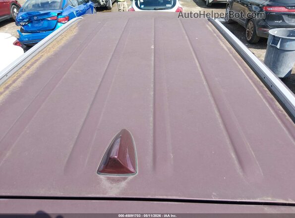 KNDMB5C14G6107380 2016 KIA SEDONA Maroon Widok wnętrza z tyłu