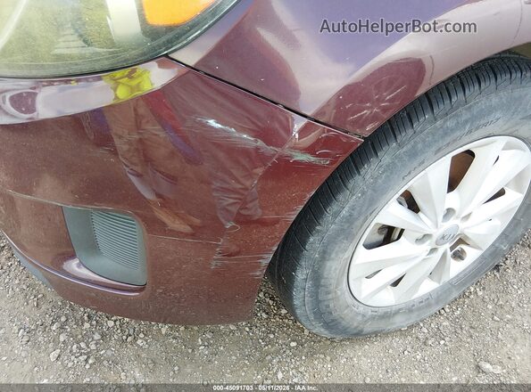 KNDMB5C14G6107380 2016 KIA SEDONA Maroon Widok z przodu