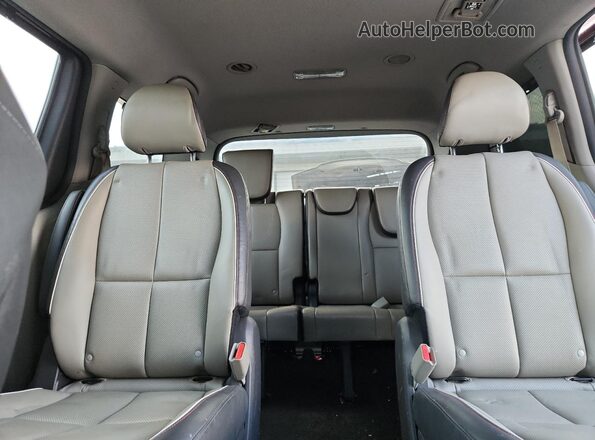 KNDMB5C15H6239145 2017 KIA SEDONA Maroon Vista de los asientos traseros