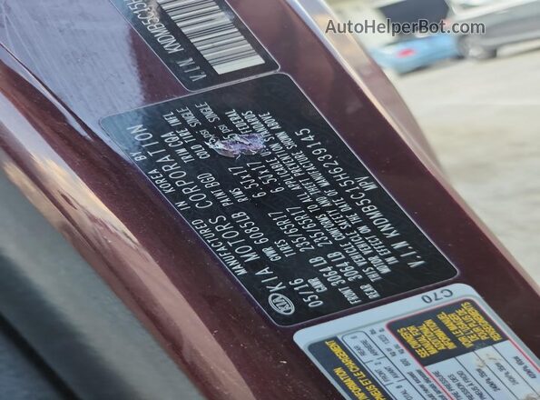 KNDMB5C15H6239145 2017 KIA SEDONA Maroon Vista de la etiqueta del VIN