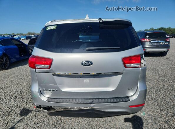 KNDMB5C15H6305919 2017 KIA SEDONA Silver Vista trasera