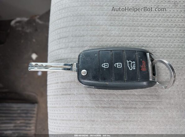 KNDMB5C16G6145242 2016 KIA SEDONA Burgundy Widok deski rozdzielczej