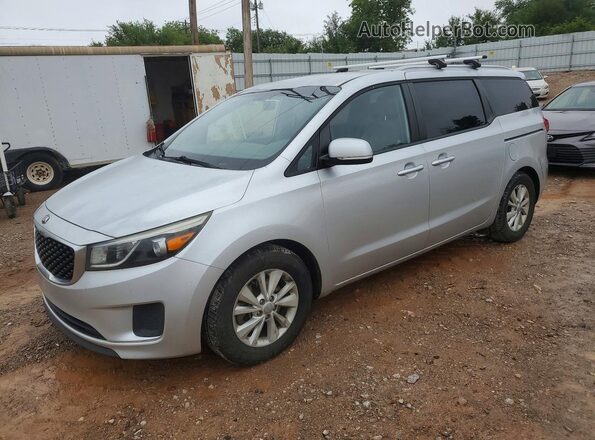 KNDMB5C16G6163238 2016 KIA SEDONA Silver Vista tres cuartos delantera izquierda