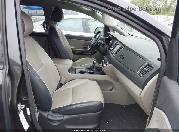 KNDMB5C16K6525772 2019 KIA SEDONA Black Front interior view