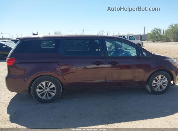 KNDMB5C17H6221679 2017 KIA SEDONA Burgundy Rear interior view