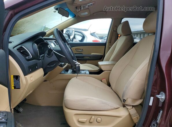 KNDMB5C17H6226591 2017 KIA SEDONA Burgundy Front interior view
