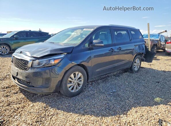 KNDMB5C17H6240331 2017 KIA SEDONA Black Առջևի ձախ երեք քառորդ տեսարան