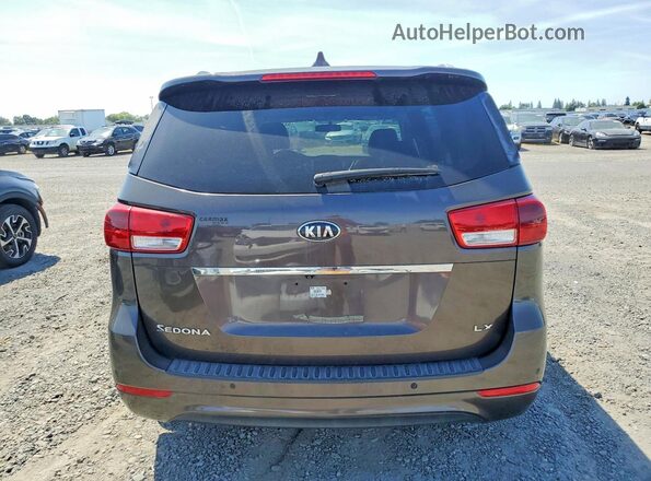 KNDMB5C18G6151446 2016 KIA SEDONA Gray უკანა ხედი