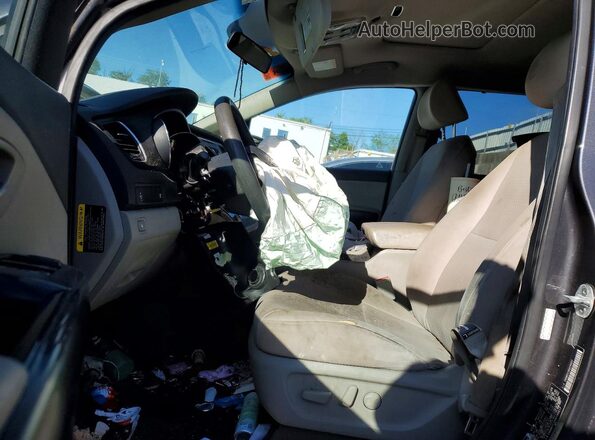 KNDMB5C18G6189517 2016 KIA SEDONA Gray Front interior view
