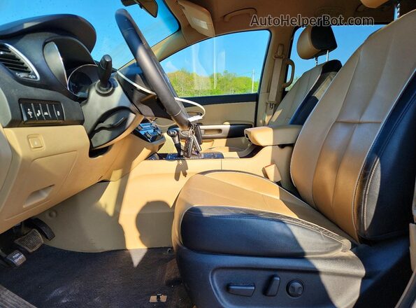 KNDMB5C19H6319659 2017 KIA SEDONA Burgundy Vista interior delantera
