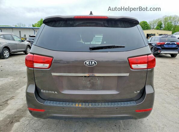KNDMB5C19H6336302 2017 KIA SEDONA Коричневый Вид сзади