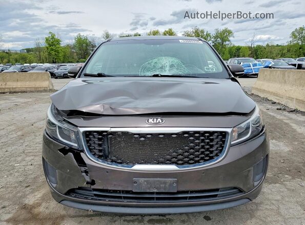 KNDMB5C19H6336302 2017 KIA SEDONA Коричневый Вид спереди