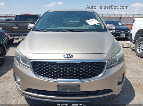 KNDMC5C17G6185035 2016 KIA SEDONA Золотой Вид спереди