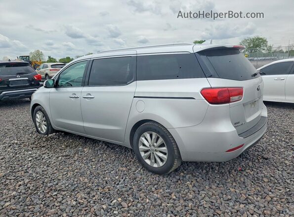 KNDMC5C1XG6136962 2016 KIA SEDONA Серебряный Задняя левая четверть