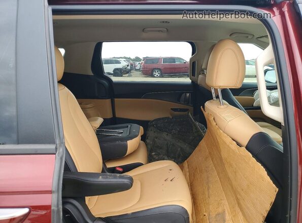 KNDNB4H36P6252932 2023 KIA CARNIVAL Red Rear interior view