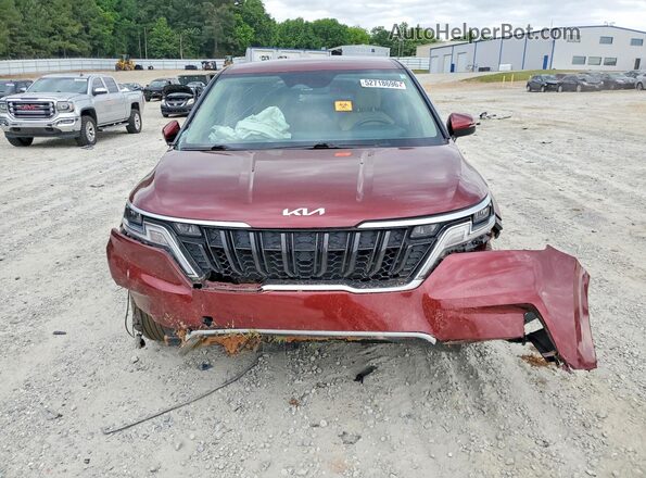 KNDNB4H36P6252932 2023 KIA CARNIVAL Red Front view