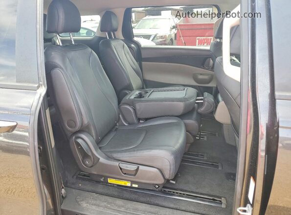 KNDNB5K3XT6570853 2026 KIA CARNIVAL Charcoal უკანა სალონის ხედი