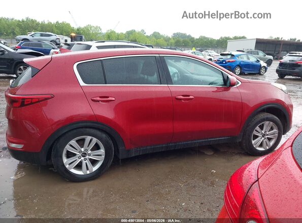 KNDPM3AC0K7493380 2019 KIA SPORTAGE Red Widok wnętrza z tyłu