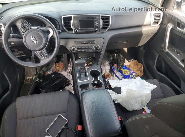 KNDPM3ACXK7596399 2019 KIA SPORTAGE Белый Вид панели приборов