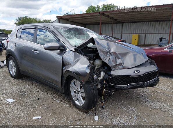 KNDPMCAC0K7494724 2019 KIA SPORTAGE Серый Передняя правая четверть