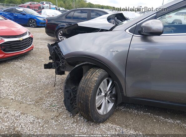 KNDPMCAC0K7494724 2019 KIA SPORTAGE Серый Вид спереди