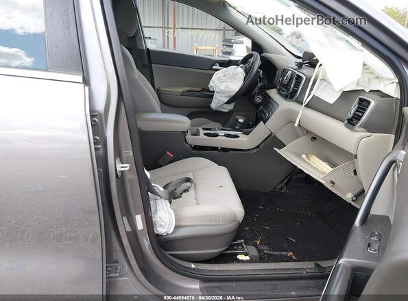 KNDPMCAC0K7494724 2019 KIA SPORTAGE Серый Вид салона спереди