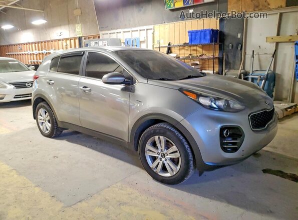 KNDPMCAC2K7598423 2019 KIA SPORTAGE Серебряный Передняя правая четверть