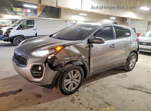 KNDPMCAC2K7598423 2019 KIA SPORTAGE Серебряный Передняя левая четверть