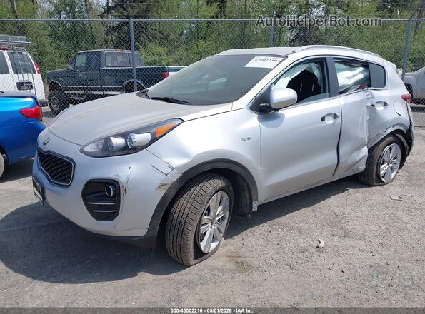 KNDPMCAC3K7616198 2019 KIA SPORTAGE Серебряный Передняя левая четверть