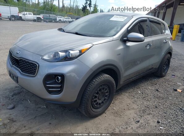 KNDPMCAC4K7613911 2019 KIA SPORTAGE Серебряный Передняя левая четверть