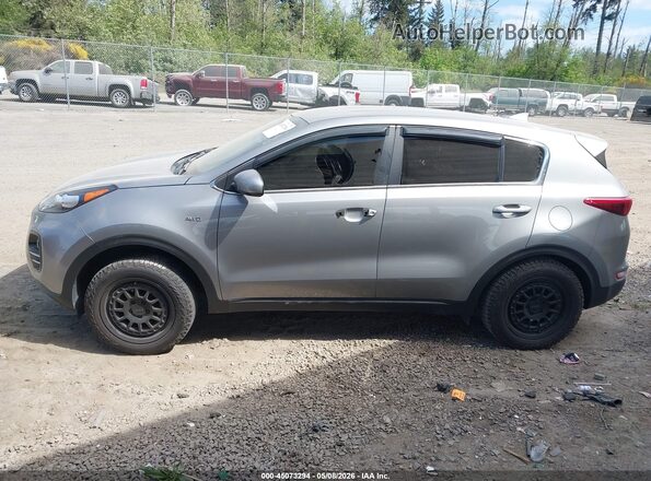 KNDPMCAC4K7613911 2019 KIA SPORTAGE Серебряный Вид задней части салона