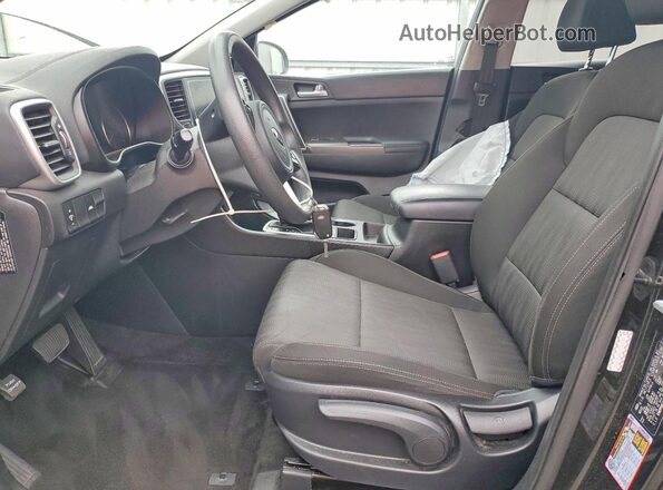 KNDPMCAC6M7938742 2021 KIA SPORTAGE Черный Вид салона спереди
