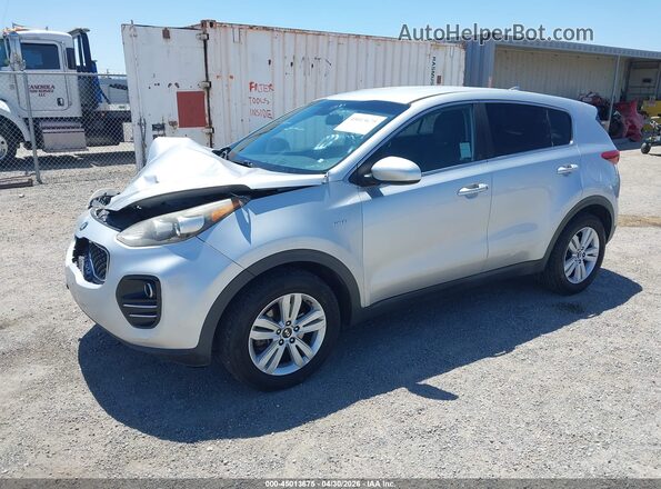 KNDPMCAC7J7381545 2018 KIA SPORTAGE Серебряный Передняя левая четверть